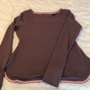 Purple long sleeve tailored waist workout shirt